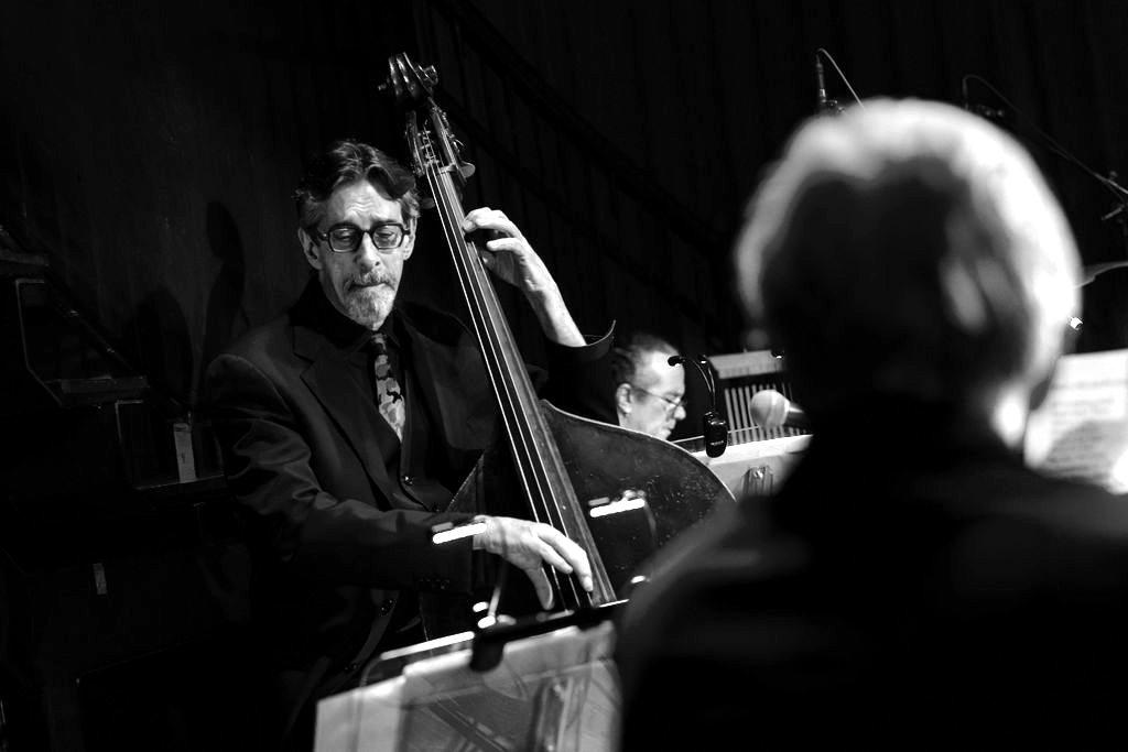 Ritt on upright bass in a concert band