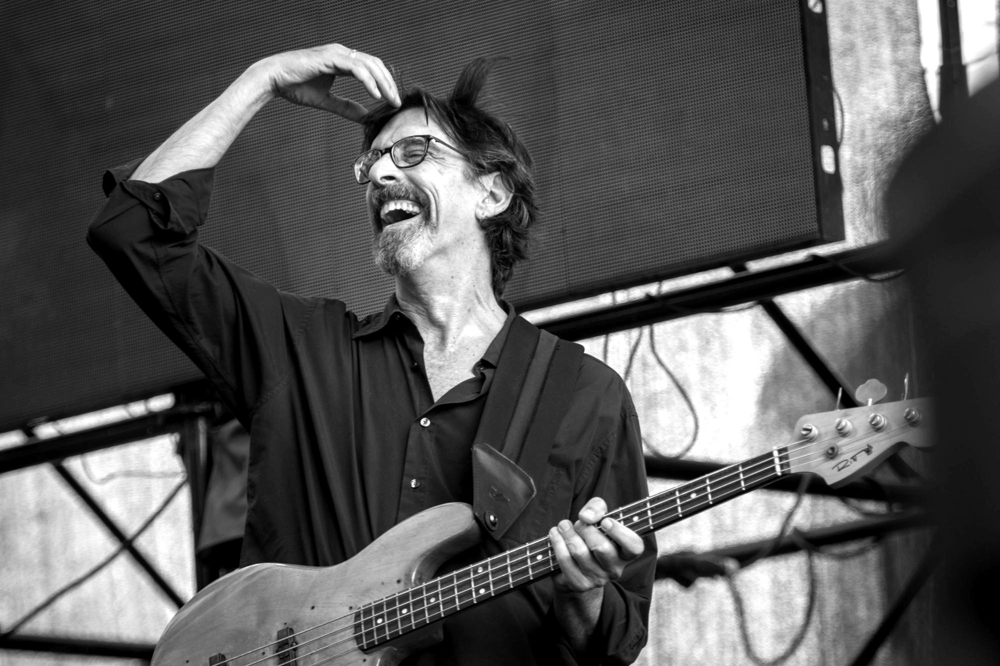 Ritt laughing onstage